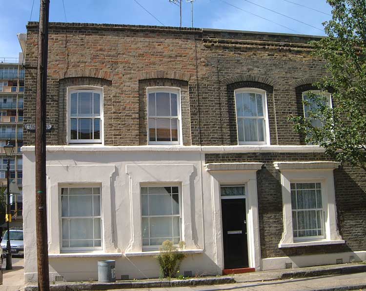 A photograph of George Lusk's house.