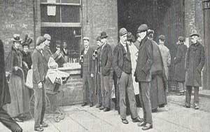 Drinkers outside a beer shop.